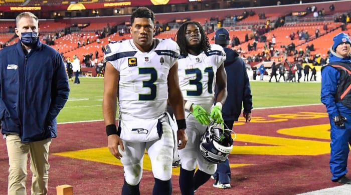 Nov 29, 2021; Landover, Maryland, USA; Seattle Seahawks quarterback Russell Wilson (3) walks off the field after the game against the Washington Football Team at FedExField.